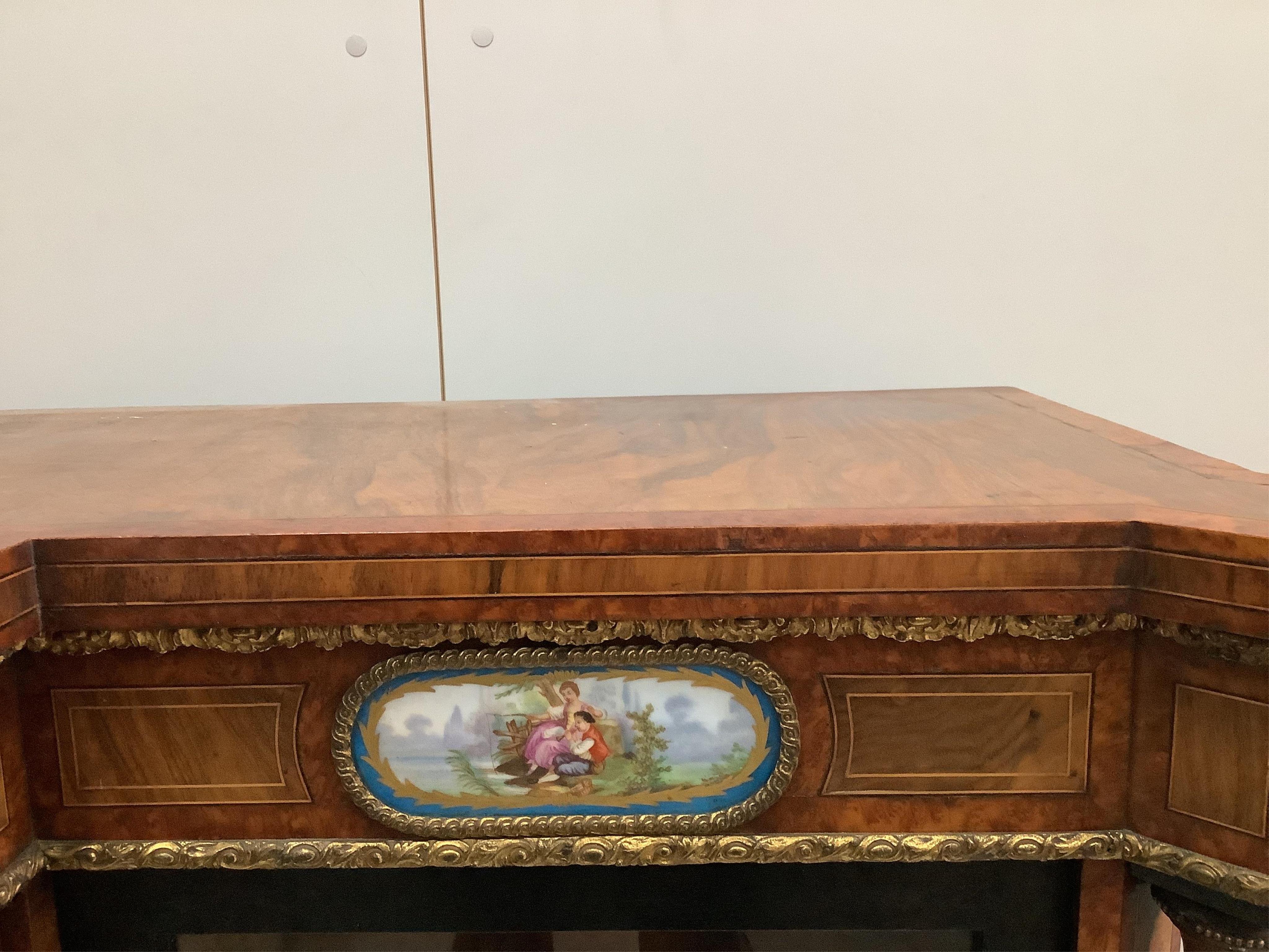 A Victorian amboyna banded figured walnut credenza, width 188cm, depth 44cm, height 109cm. Condition - fair to good